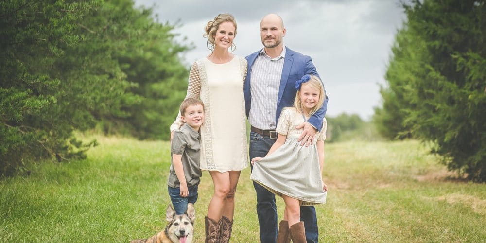 Portrait of family of four and their dog in Northern Virginia